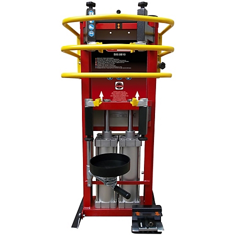 Roter und gelber Werkzeugrahmen mit Hydraulikzylindern und Fußschalter. Beschriftungen und Pfeile sind erkennbar.